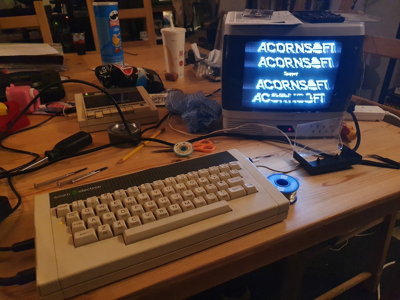A small portable tv hooked up to an acorn electron